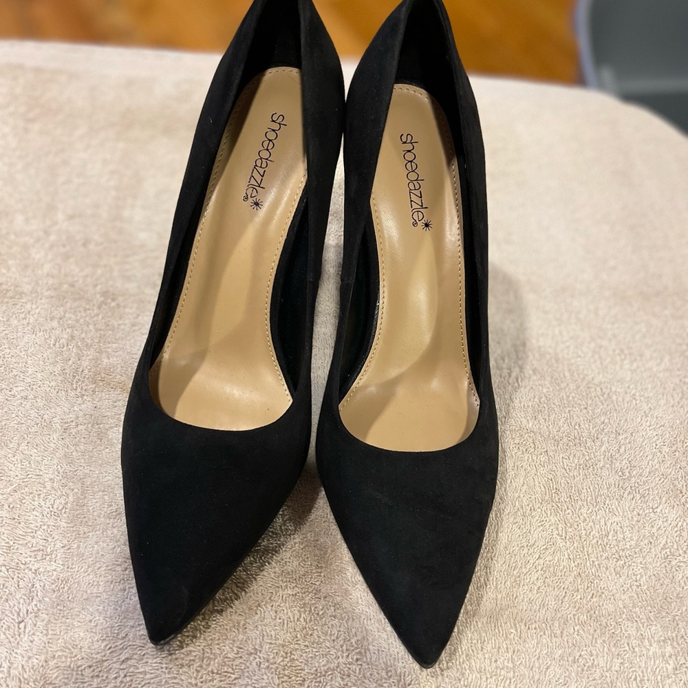 Womens size 11 high heels. Never worn.